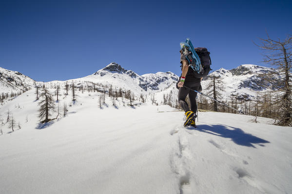 Alpinist on springtime's snow (Val Chalamy, Mont Avic Natura Park, Aosta Valley, Italy)