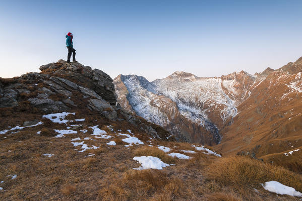 Alpinist on a summit, Valle Soana, Gran Paradiso National Park, Piedmont, Italy, Italian alps