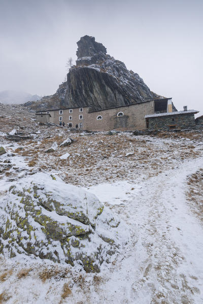 First winter's snow at San Besso sanctuary, Valle Soana, Gran Paradiso National Park, Piedmont, Province of Turin, Italian alps, Italy