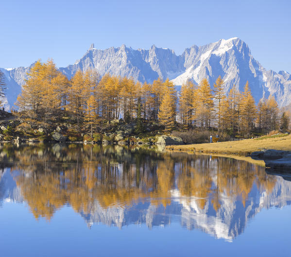 Grandes Jorasses and Dent du Geant are reflected on Arpy Lake, Valdigne, Aosta Valley, Italian alps, Italy
