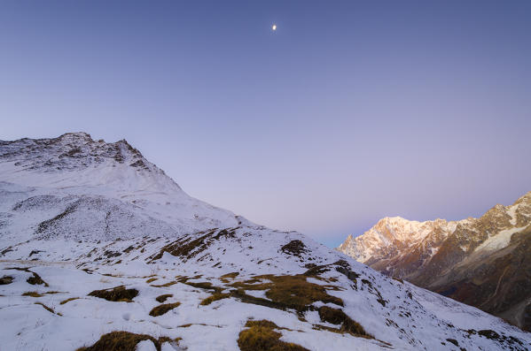 Lights before the sunrise in Malatra Valley, Val Ferret, Aosta Valley, Italian alps, Italy