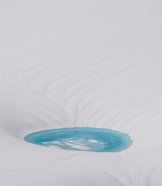 a tiny lake on the Forni glacier, Valtellina, Italy, Alps