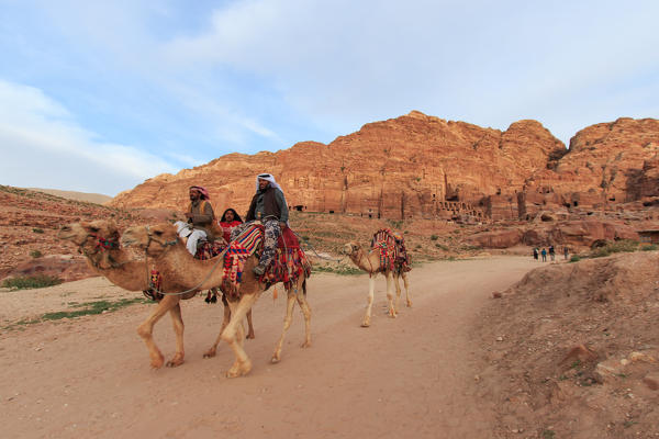 Tourist exploring the ruins of ancient Petra, Jordan