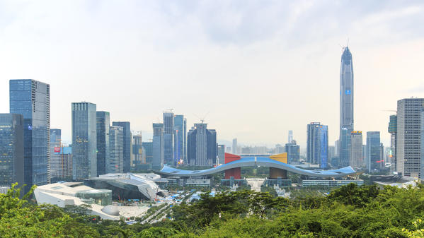Shenzhen cityscape at sunset with the Civic Center and the Ping An IFC on foreground, China