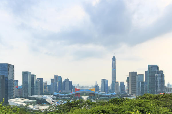 Shenzhen cityscape at sunset with the Civic Center and the Ping An IFC on foreground, China