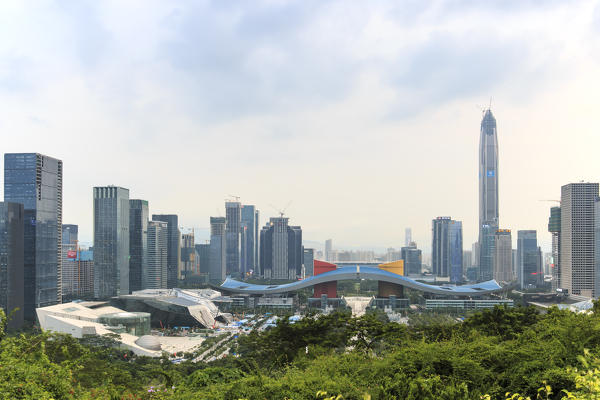 Shenzhen cityscape at sunset with the Civic Center and the Ping An IFC on foreground, China