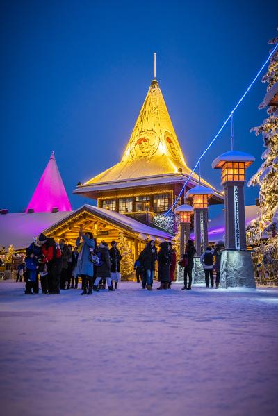 People in front Santa Claus Office, Santa Claus Village, Rovaniemi, Lapland, Finland, Europe.