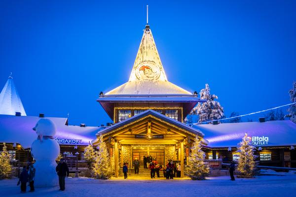 People in front Santa Claus Office, Santa Claus Village, Rovaniemi, Lapland, Finland, Europe.