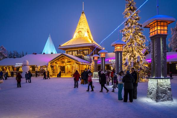 People in front of Santa Claus Office, Santa Claus Village, Rovaniemi, Lapland, Finland, Europe.