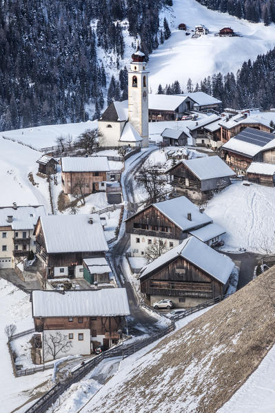 The village of Corte / Curt in the valley of Marebbe / Enneberg in winter, Bolzano, Alto Adige, Südtirol, Italy