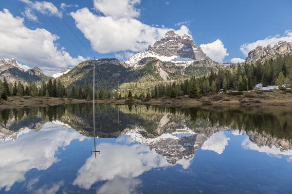 Tre Cime di Lavaredo reflected in an ephemeral lake at the thaw, dolomites, auronzo di cadore, belluno, veneto