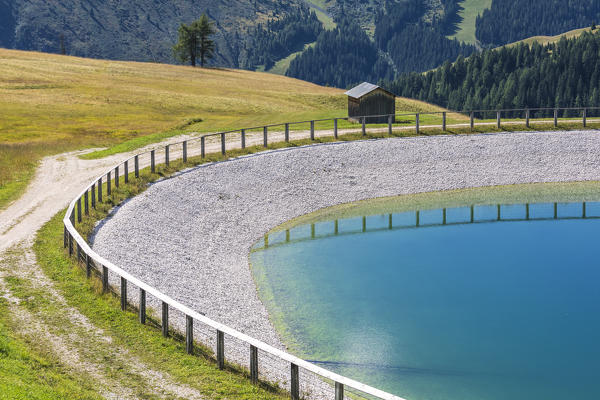 Small artificial lake near the Bec de Roces refuge, Dolomites, Arabba, Livinallogo del Col di Lana, Belluno, Veneto, Italy