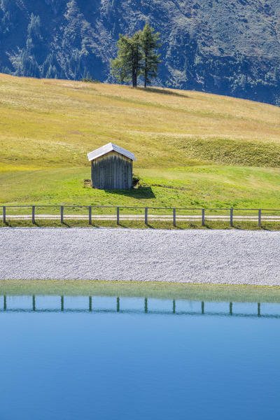 Small artificial lake near the Bec de Roces refuge, Dolomites, Arabba, Livinallogo del Col di Lana, Belluno, Veneto, Italy