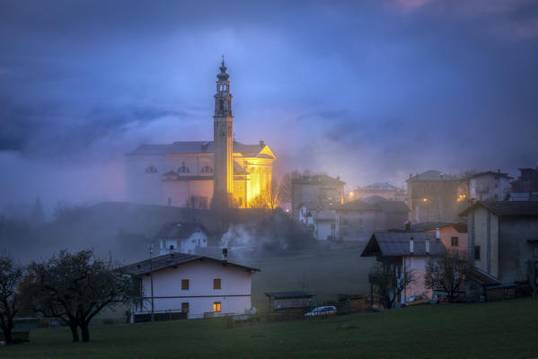 Domegge di Cadore at dusk with the church of San Giorgio martire, Cadore, Belluno, Veneto, Italy