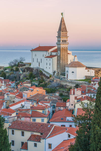 Twilight on the historic town of Piran with the church of St. George, Primorska, Istria, Slovenia