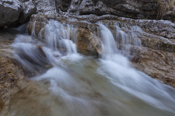 Dolomites, Belluno, Veneto, Italy.  Little waterfalls in the Val Soffia, Mis valley