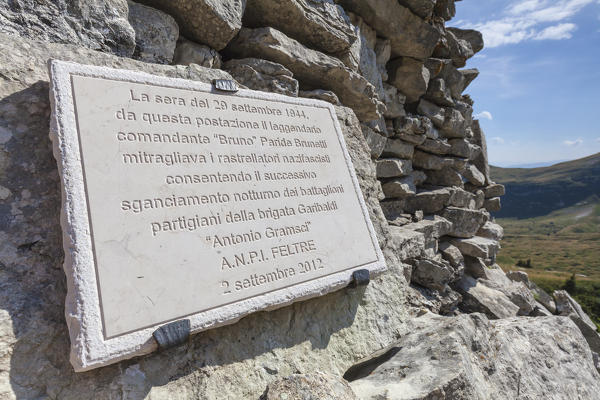 Europe, Italy, Veneto, Belluno. Military memorial stone at passo Pietena, Vette Feltrine, Belluno Dolomites National Park