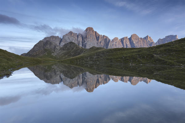 Europe, Italy, Trentino, Dolomites. The small lake of Caladora, not far from Valles pass, with the Pale di San Martino (Pala group).