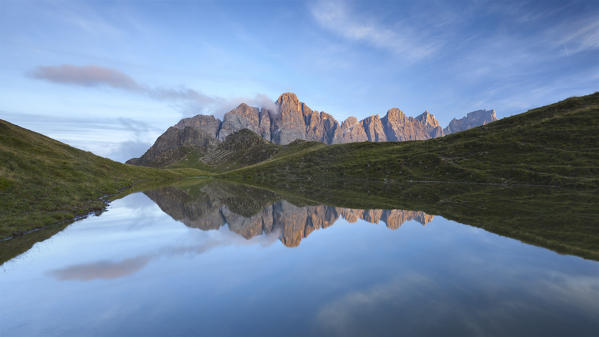 Europe, Italy, Trentino, Dolomites. The small lake of Caladora, not far from Valles pass, with the Pale di San Martino (Pala group).