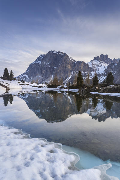 Europe, Italy, Veneto, Falzarego, Belluno. 
Spring thaw at the Lake of Limedes, on the background Lagazuoi and Fanis, Dolomites