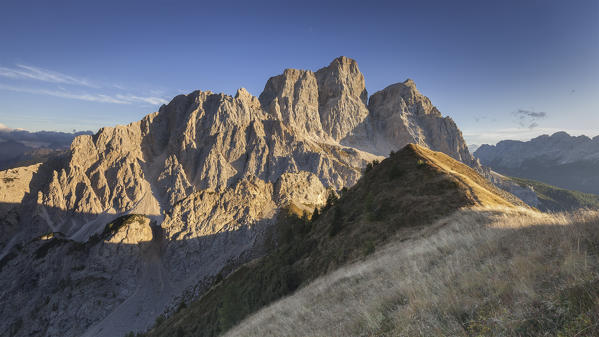 Europe, Italy, Veneto, Cadore.  Autumnal sunset towards Mount Pelmo from the top of the Col de la Puina, Dolomites