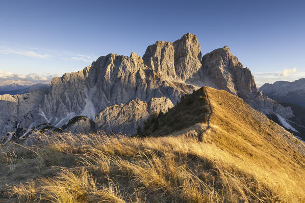 Europe, Italy, Veneto, Cadore.  Autumnal sunset towards Mount Pelmo from the top of the Col de la Puina, Dolomites