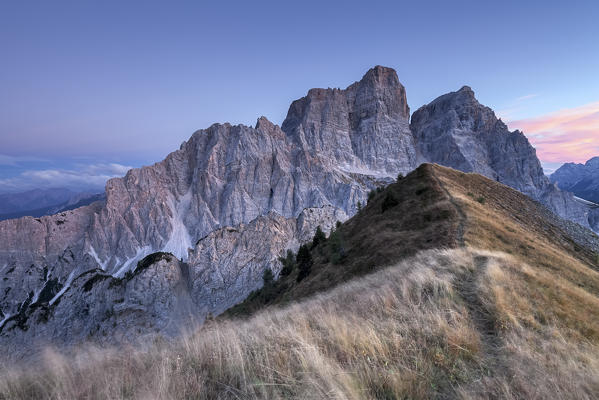 Europe, Italy, Veneto, Cadore.  Autumnal dusk on top of the Col de la Puina towards mount Pelmo, Dolomites