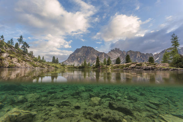 Europe, Italy, Veneto, Belluno. Lake Limedes, above and under the water, Dolomites