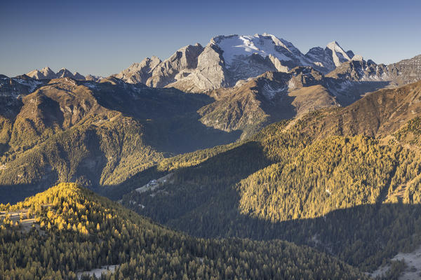 Europe, Italy, Veneto, Belluno. The grassy ridge of Padon, behind it the Marmolada, Dolomites