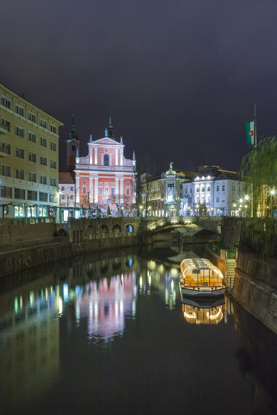 Europe, Slovenia, Ljubljana. Tromostovje in the city center by night