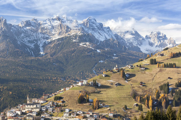 Europe, Italy, Veneto, Belluno, Comelico. A view of Casamazzagno with the church of San Leonardo, Dolomites