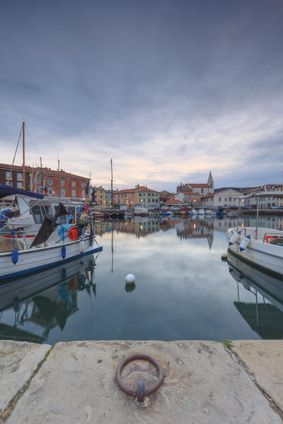 Europe, Slovenia, Primorska, Izola. Old town and the harbour with fishing boats in the morning