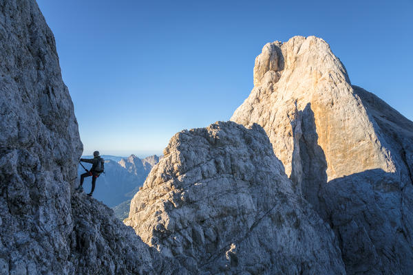 Europe, Italy, Veneto, Agordino, mountain climber on the via ferrata Stella Alpina at mount Agner, Pale di San Martino, Dolomites (MR)