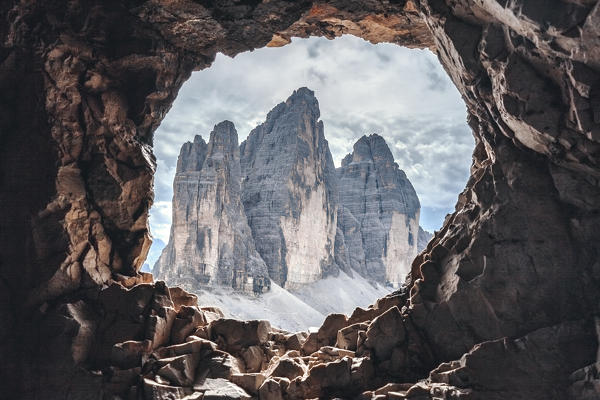 Tre Cime di Lavaredo (Drei Zinnen) views from a hole in the rock of the First World War, Dolomites, Auronzo di Cadore, Belluno, Veneto, Italy