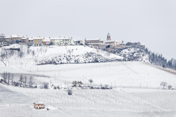 Langhe, Cuneo district, Piedmont, Italy. Langhe wine region winter snow, La Morra village