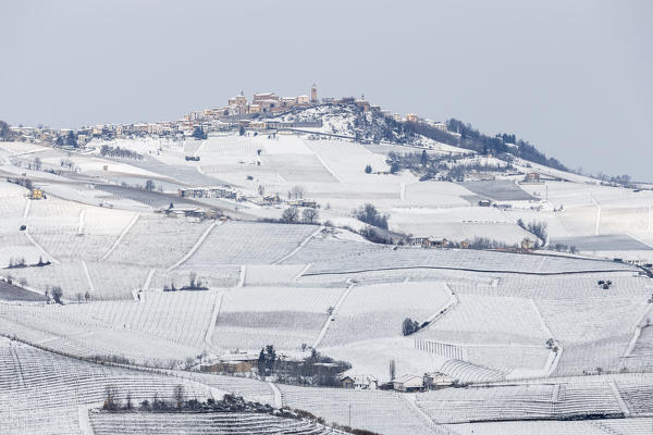 Langhe, Cuneo district, Piedmont, Italy. Langhe wine region winter snow, La Morra village
