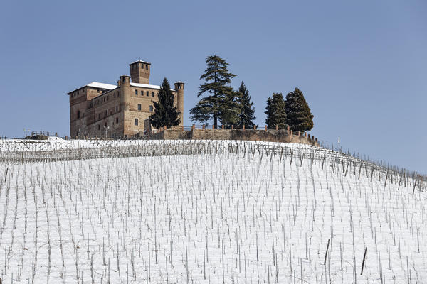 Langhe, Cuneo district, Piedmont, Italy. Langhe wine region winter snow, Grinzane Cavour castle