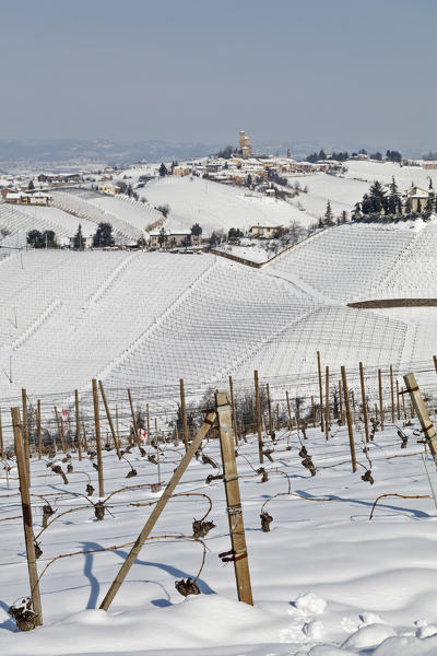 Langhe, Cuneo district, Piedmont, Italy. Langhe wine region winter snow, Serralunga d’Alba castle