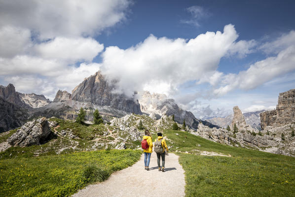 Peolpe walking in Cinque Torri natural Park, Cortina d'Ampezzo, Belluno province, Dolomites, Veneto, Italy
