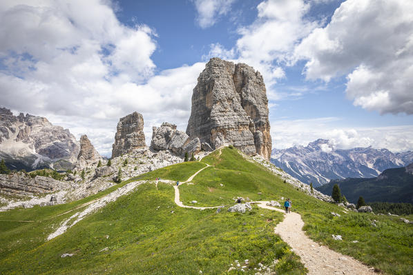 Peolpe walking in Cinque Torri natural Park, Cortina d'Ampezzo, Belluno province, Dolomites, Veneto, Italy