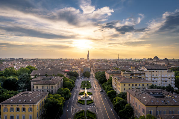 The city of Modena with its tower named Ghirlandina, during sunset. Modena, Emilia Romagna, Italy