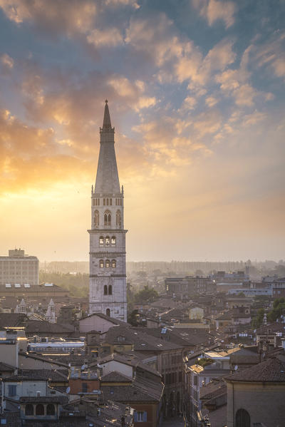 The city of Modena with its tower named Ghirlandina, during sunset. Modena, Emilia Romagna, Italy