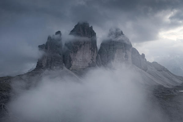 Lavaredo three peaks during a cloudy evening. Aerial view. Bolzano province, South Tyrol, Italy