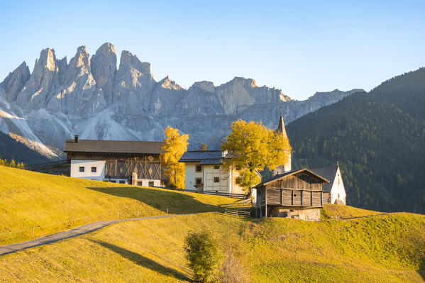 View of Santa Magdalena village with Odle Mountain Group on the background. Funes valley, South Tyrol, Italy.