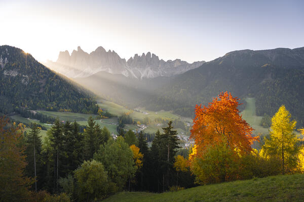 View of Santa Magdalena village with Odle Mountain Group on the background. Funes valley, South Tyrol, Italy.