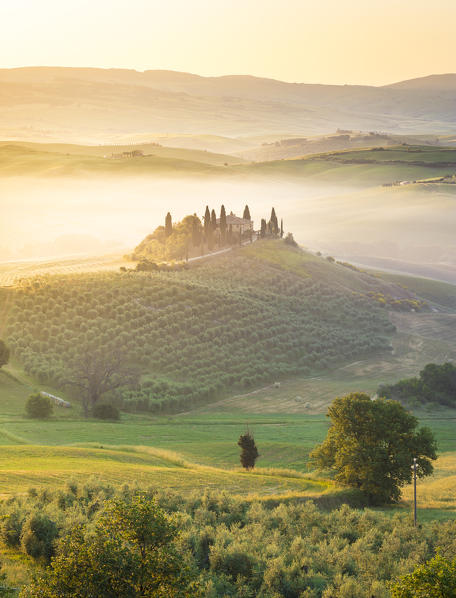 Podere Belvedere, the famous italian farmhouse, during sunrise. Val d'Orcia, Siena province, Tuscany, Italy