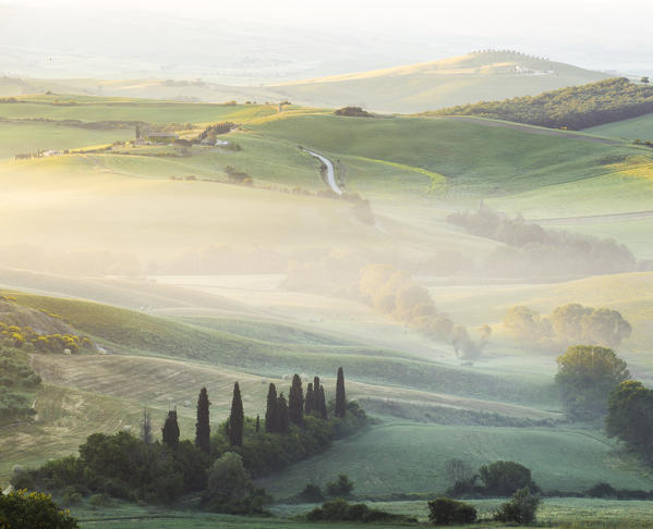 Podere Belvedere, the famous italian farmhouse, during sunrise. Val d'Orcia, Siena province, Tuscany, Italy