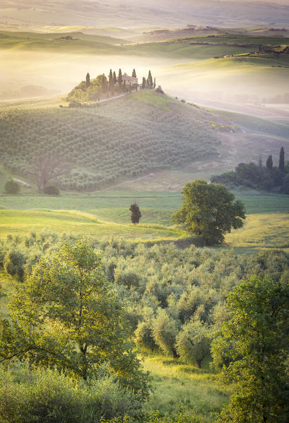 Podere Belvedere, the famous italian farmhouse, during sunrise. Val d'Orcia, Siena province, Tuscany, Italy