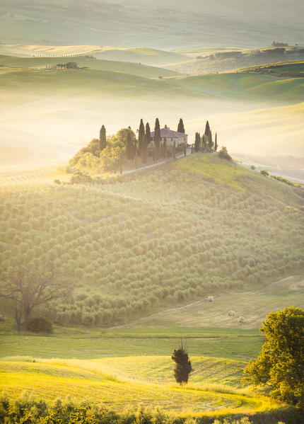 Podere Belvedere, the famous italian farmhouse, during sunrise. Val d'Orcia, Siena province, Tuscany, Italy