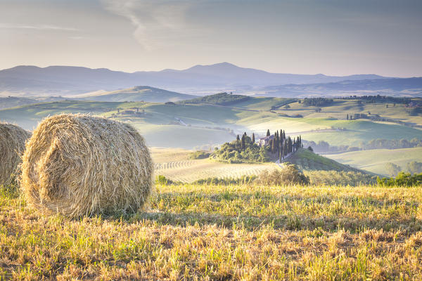 Podere Belvedere, the famous italian farmhouse, during sunrise. Val d'Orcia, Siena province, Tuscany, Italy